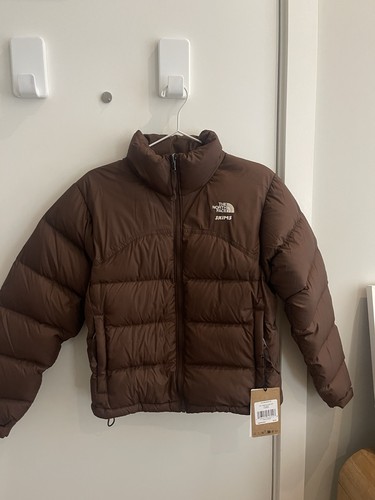 The north face skims nuptse - north,